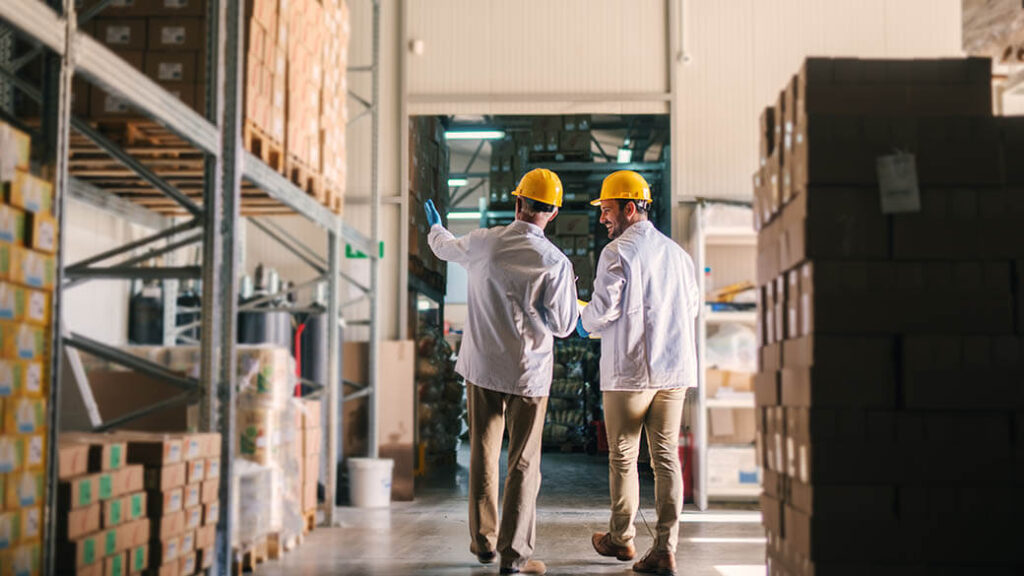 2-father-and-son-standing-in-their-warehouse-0320