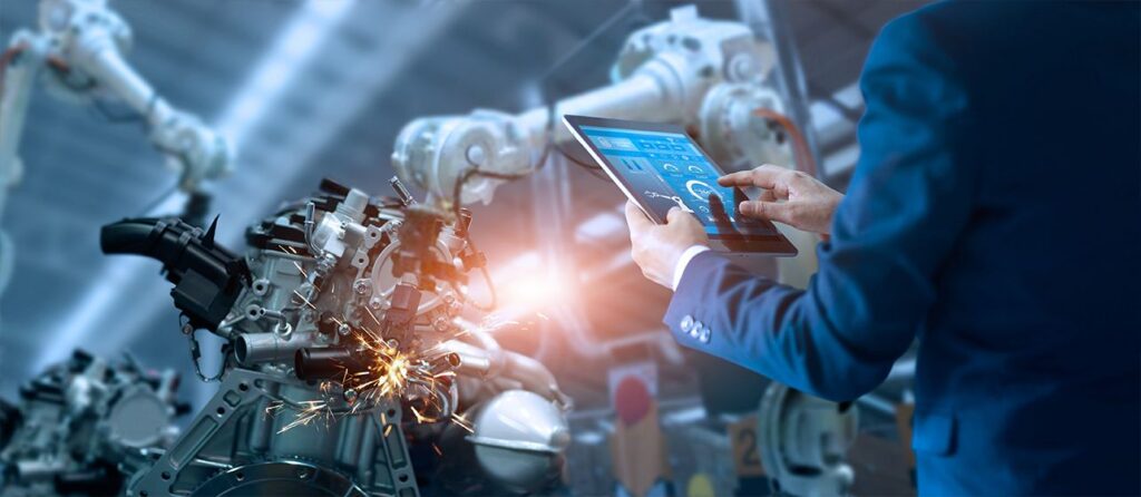 Engineer controlling robot arms