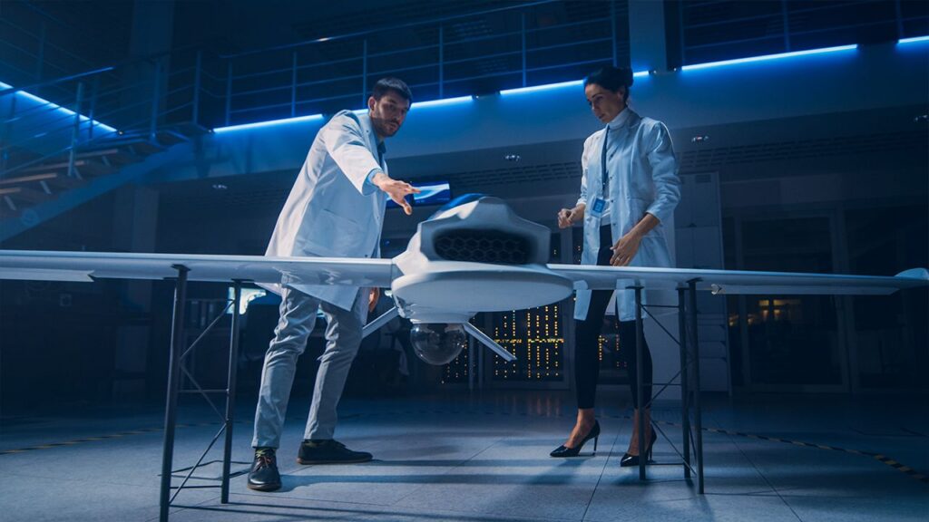 Two engineers working on an aerial vehicle